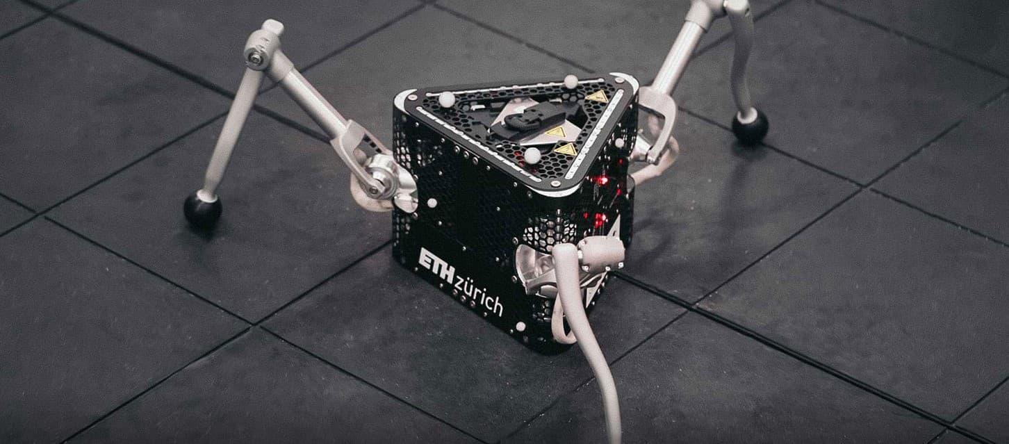 Legged hopping robot to explore microgravity environments